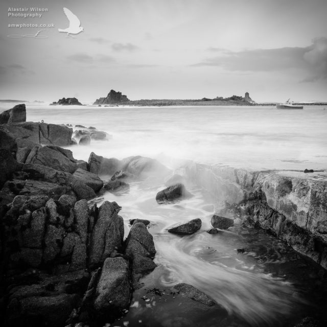 Waves flooding over Pereglis slipway, St Agnes, Isles of Scilly